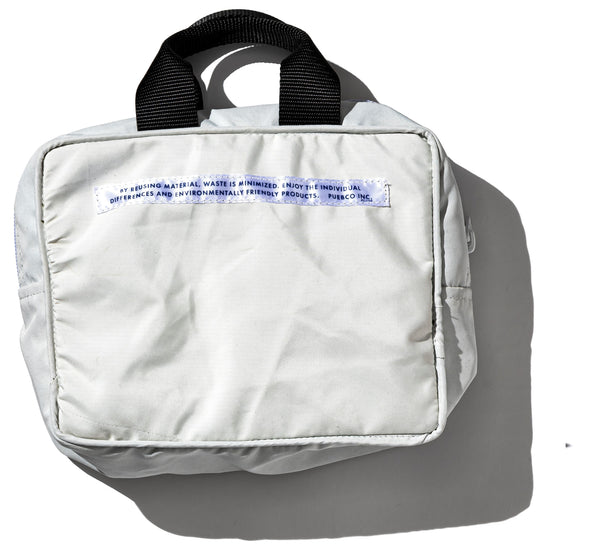 SNOW JACKET CONVERTED TO HANDBAG - LIM.ED.