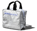 SNOW JACKET CONVERTED TO HANDBAG - LIM.ED.