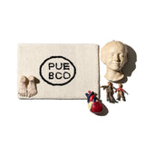 TUFTED MAT / PUEBCO LOGO